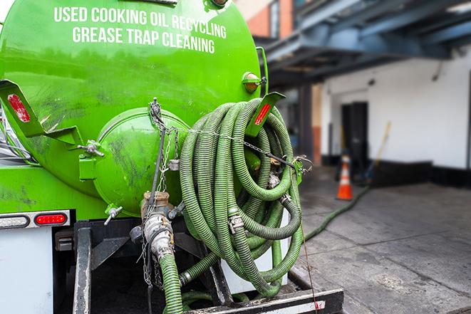 truck pumping out a large grease trap in Manteca CA